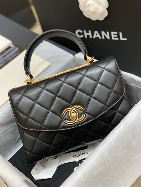 chanel flap bag with handle.